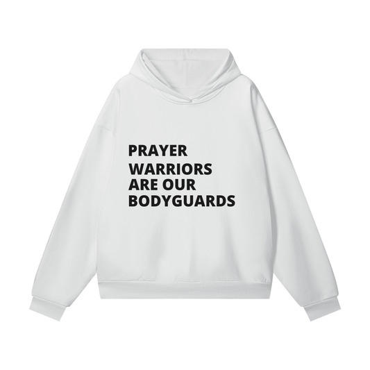 A white pullover hoodie with the text 'PRAYER WARRIORS ARE OUR BODYGUARDS' printed in black capital letters on the chest.